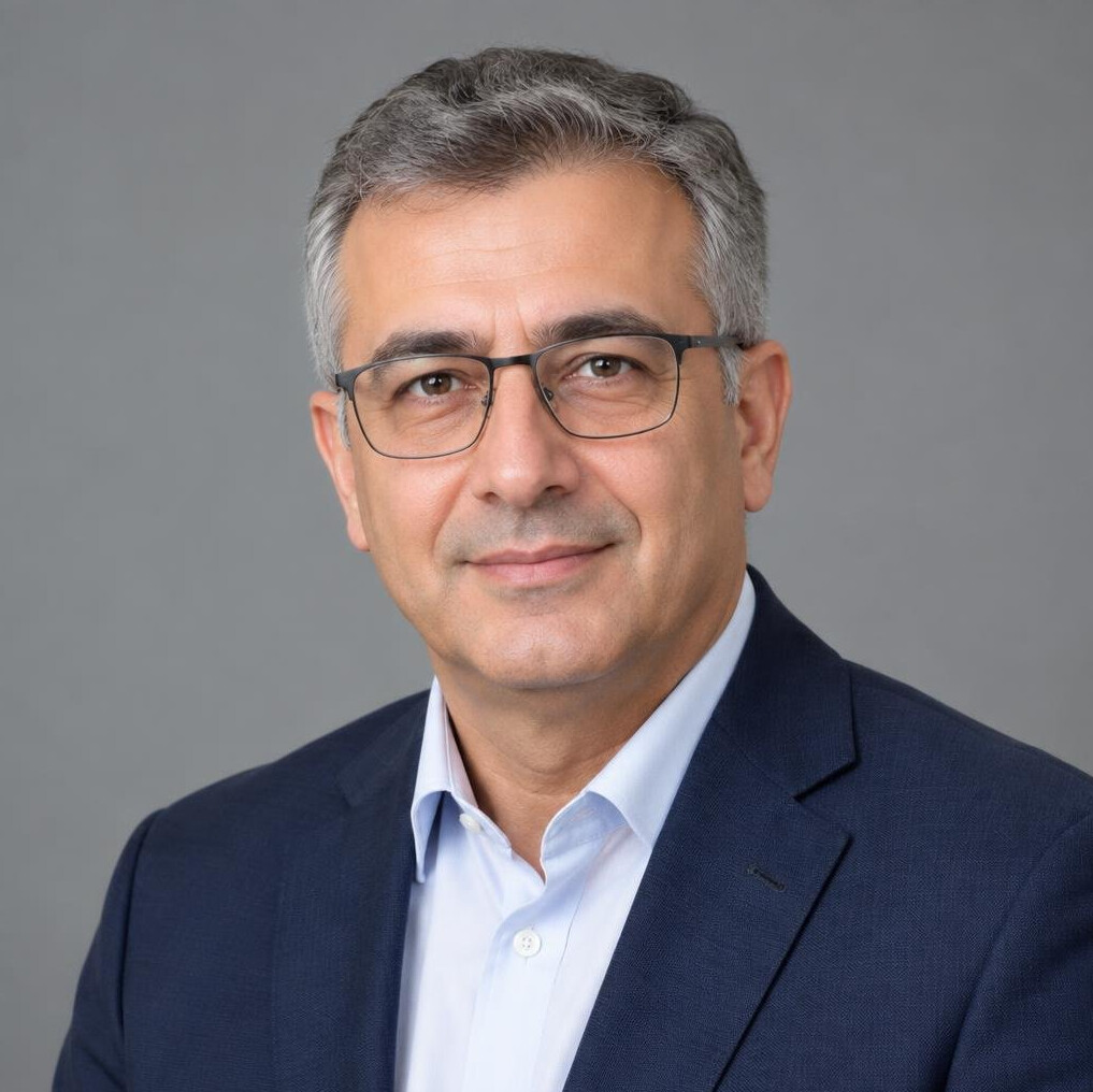 Portrait of a Turkish man in his 50s, mediation consultant
