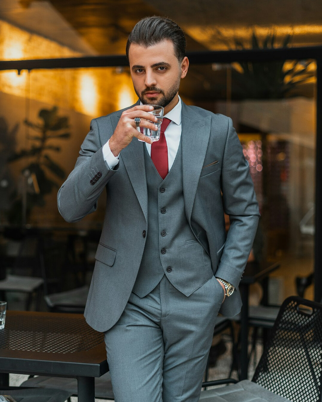 Portrait of a Turkish man in his 40s wearing a suit, media consultant