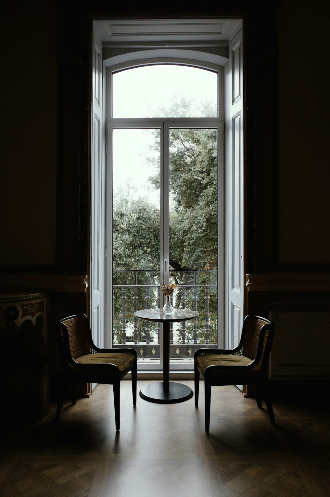 Two people mediating a calm discussion at a small table